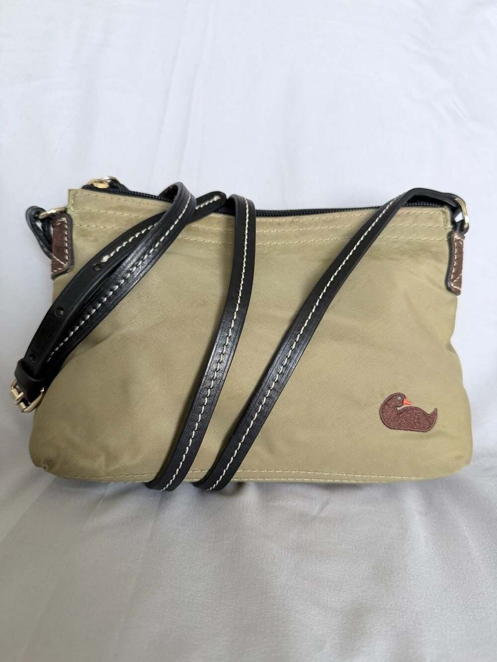 Dooney & Bourke Olive Green Nylon Crossbody Bag with Leather Strap and Pink Inte